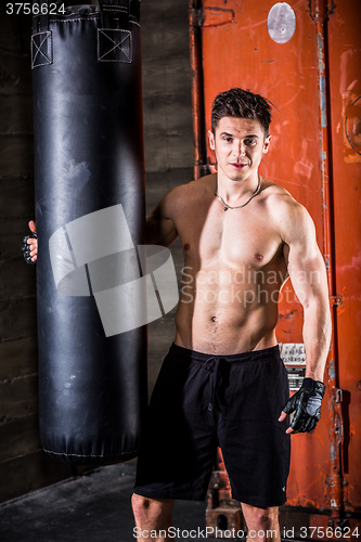 Image of Young man boxing workout