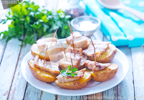 Image of baked potato with lard