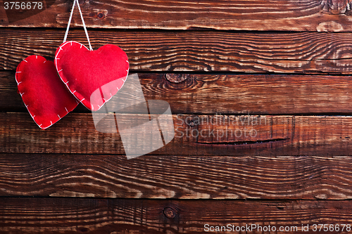 Image of hearts on wood