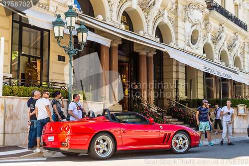 Image of Red Ferrari and Hotel de Paris in Monte Carlo