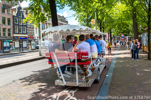 Image of People riding bicycles in Amsterdam