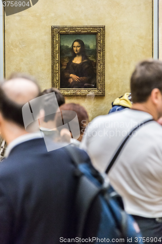 Image of Visitors take photo of Leonardo DaVinci\'s \"Mona Lisa\" at the Lou