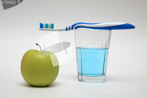 Image of Apple and Toothbrush