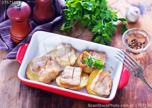 Image of baked potato with lard