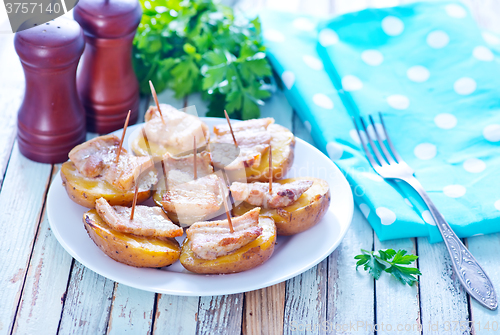 Image of baked potato with lard