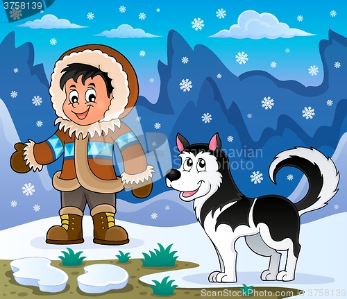 Image of Inuit boy with Husky dog