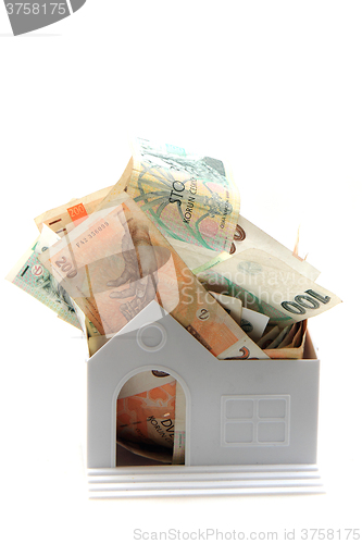 Image of czech money and house