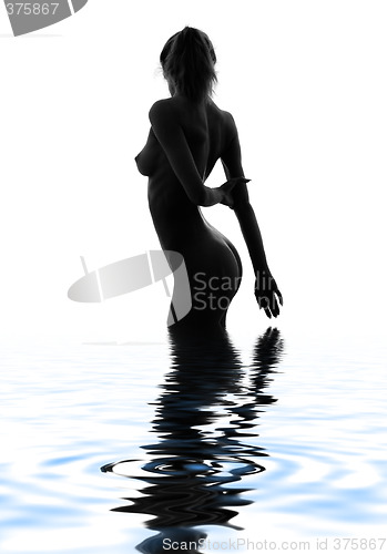 Image of monochrome silhouette image of naked girl in water