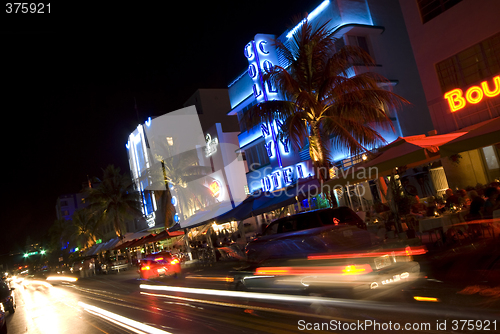 Image of art deco hotel neon lights night scene