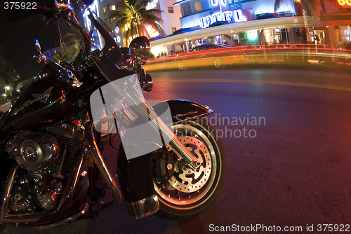 Image of motorcycle south beach night scene