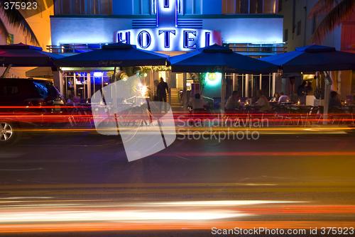 Image of art deco hotel neon lights night scene