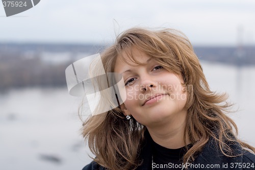 Image of Portrait of the beautiful girl outdoor 3
