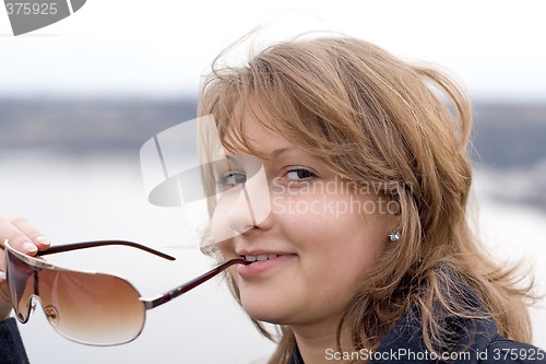Image of Portrait of the beautiful girl outdoor 4
