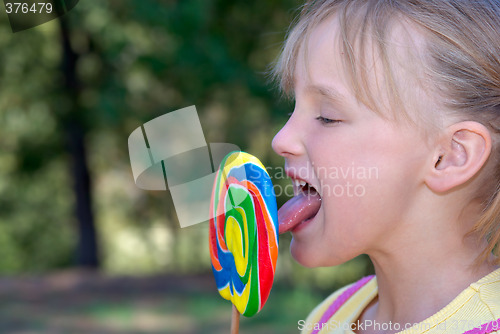 Image of girl with lollipop