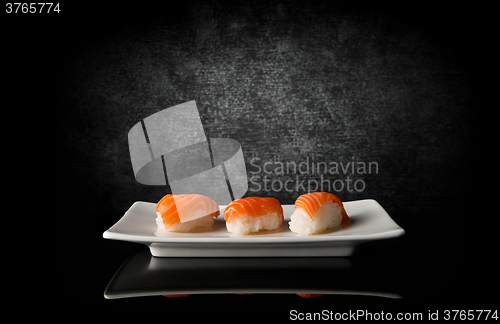 Image of Three sushi on black
