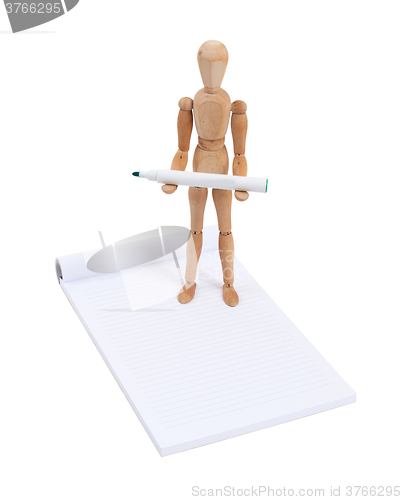 Image of Wooden mannequin writing 
