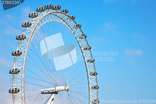 Image of london eye in the s  and white clouds