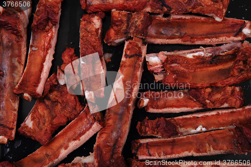 Image of smoked pig ribs background