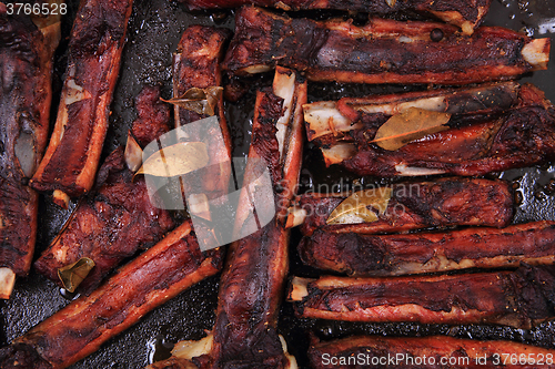 Image of smoked pig ribs background