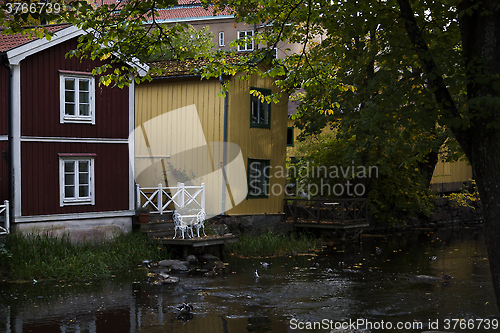 Image of houses by the river