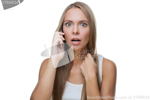 Image of Beautiful woman talking on phone