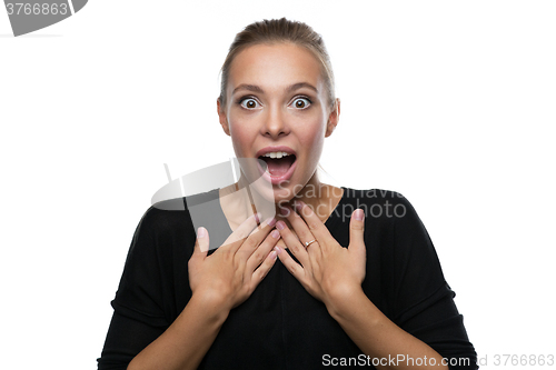 Image of Portrait of surprised woman on white background