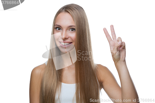 Image of Beautiful woman shows gesture v