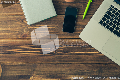 Image of Laptop and diary on the desk