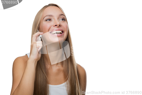 Image of Beautiful woman talking on phone