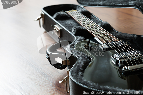 Image of Electric guitar in the case