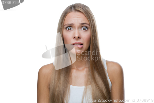 Image of Portrait of shocked woman on white background