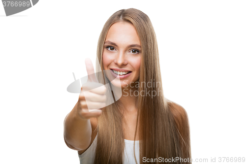 Image of Portrait of beautiful woman show thumb up