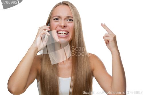 Image of Angry woman talking on phone