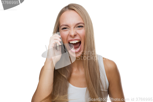 Image of Laughing woman talking on phone