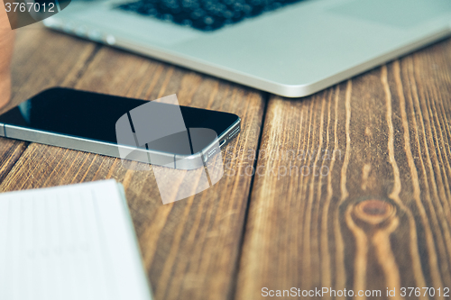 Image of Laptop and diary on the desk