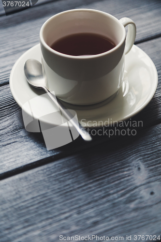 Image of Cup of tea on Wooden Table