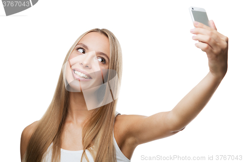 Image of beautiful woman make selfie on white background