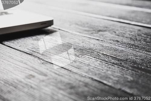 Image of Laptop on modern wooden desk 