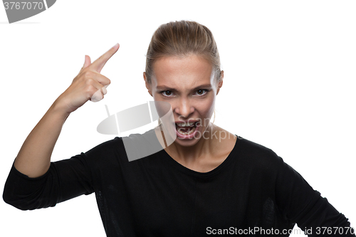 Image of Portrait of angry woman on white background