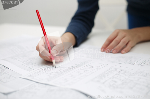 Image of Architect sketching a construction project