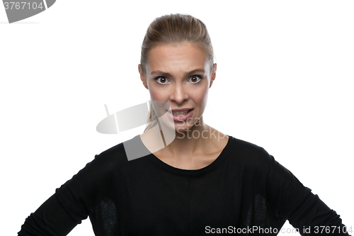 Image of Portrait of angry woman on white background