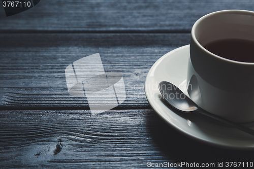 Image of Cup of tea on Wooden Table