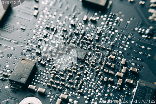 Image of Printed Circuit Board with electrical components.