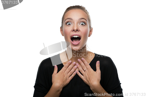 Image of Portrait of surprised woman on white background