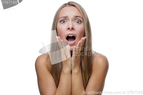 Image of Portrait of surprised woman on white background