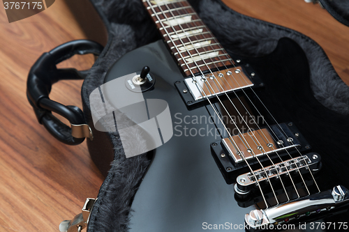 Image of Electric guitar in the case