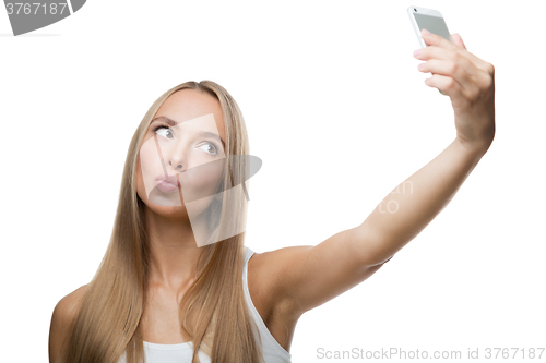 Image of beautiful woman make selfie on white background