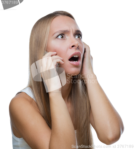 Image of Beautiful woman talking on phone