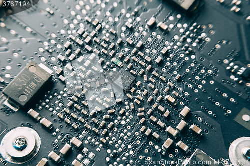 Image of Printed Circuit Board with electrical components.