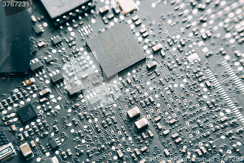 Image of Printed Circuit Board with electrical components.